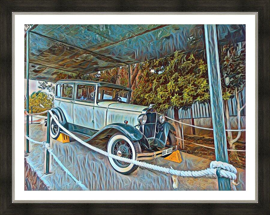 Framed vintage car print in light blue under a canopy with rope barrier and trees