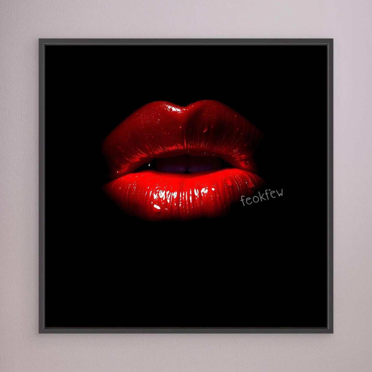 Framed classic art print of glossy red lips on dark background
