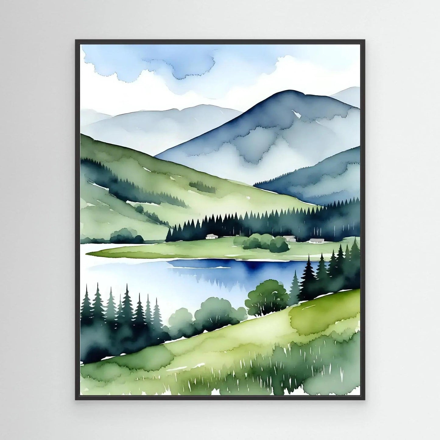 Black-framed wall art print of mountain lake landscape with green hills and blue water.