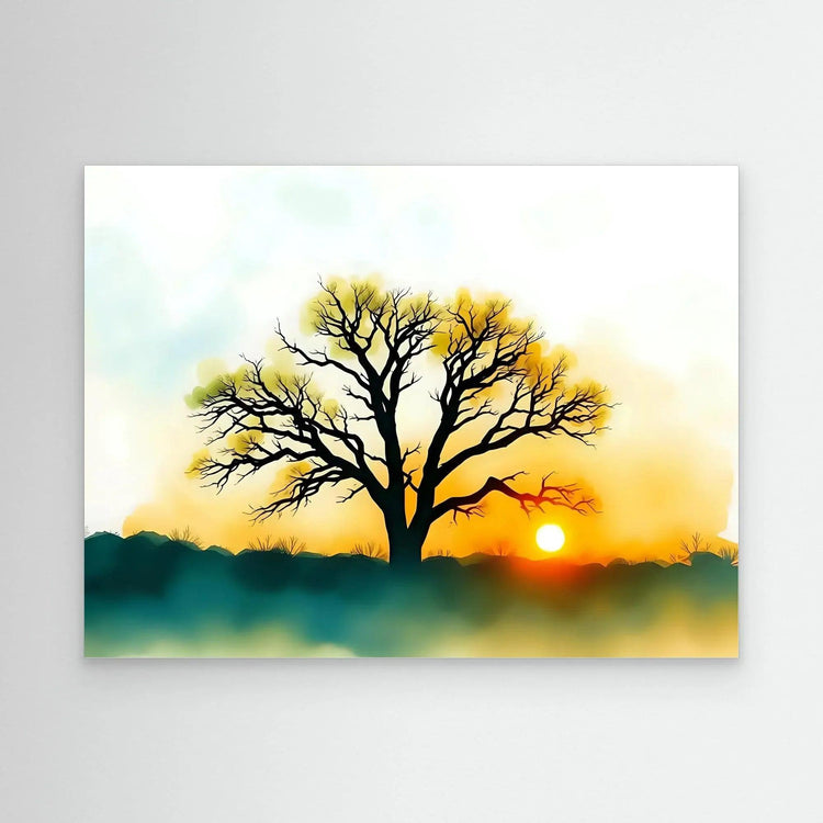 Framed wall art of a lone tree silhouette at sunset with golden sun and green hills