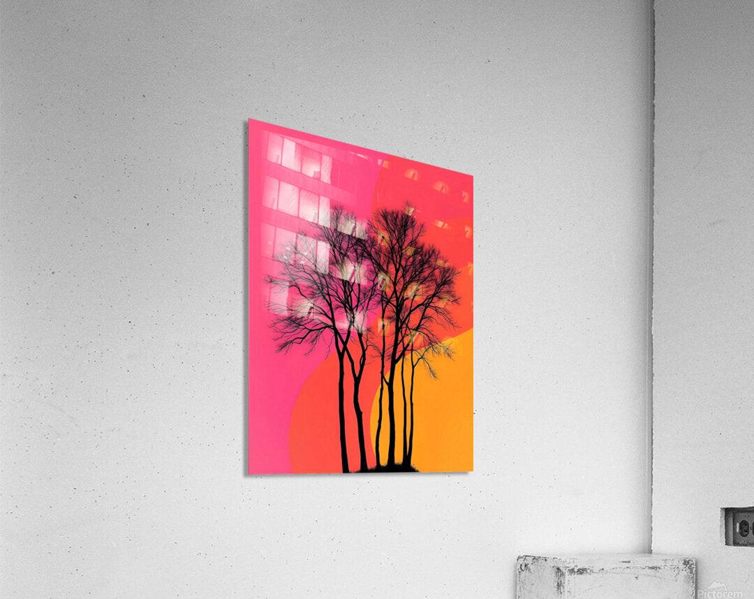 Unframed wall art featuring black tree silhouettes over pink and orange sunset tones