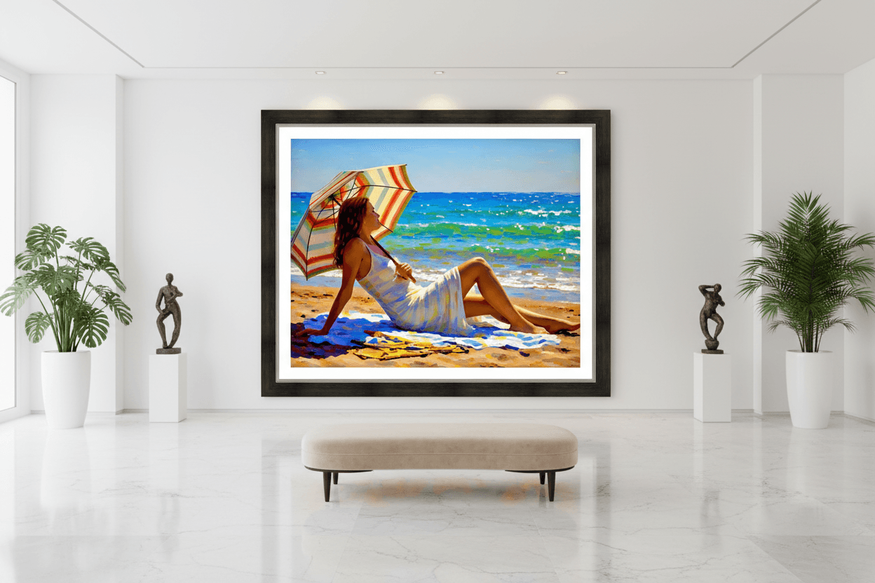 Framed beach artwork featuring a reclining woman holding a striped umbrella
