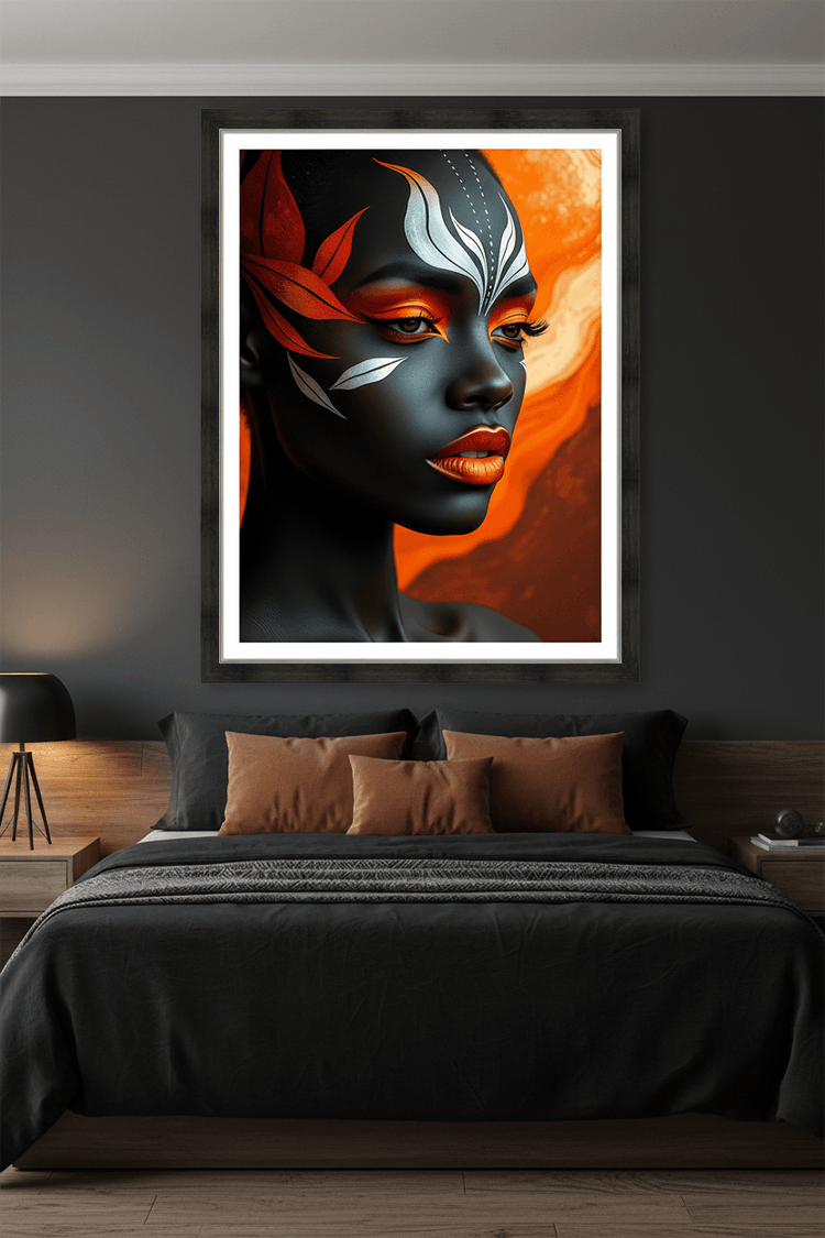 Framed portrait artwork of stylized dark face with teal markings and red accents on orange