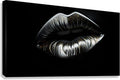 Silver and gold dust lips wall art on black background, close-up canvas