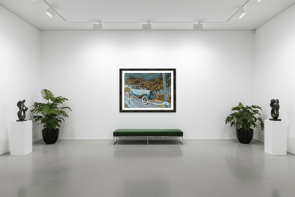 Framed vintage car artwork in a gallery room with bench and potted plants