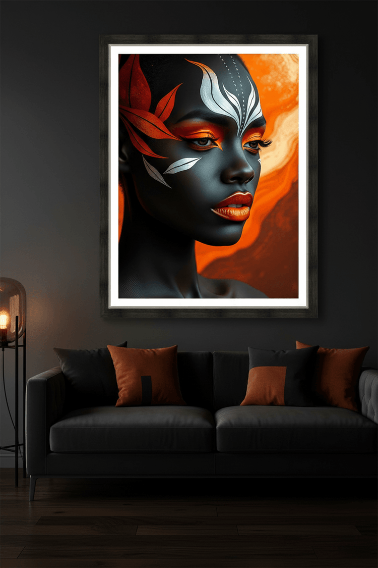 Framed portrait artwork of stylized dark face with teal markings and red-orange accents