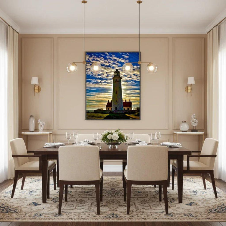 Framed lighthouse wall art with a tall lighthouse tower and clouds over a sunset