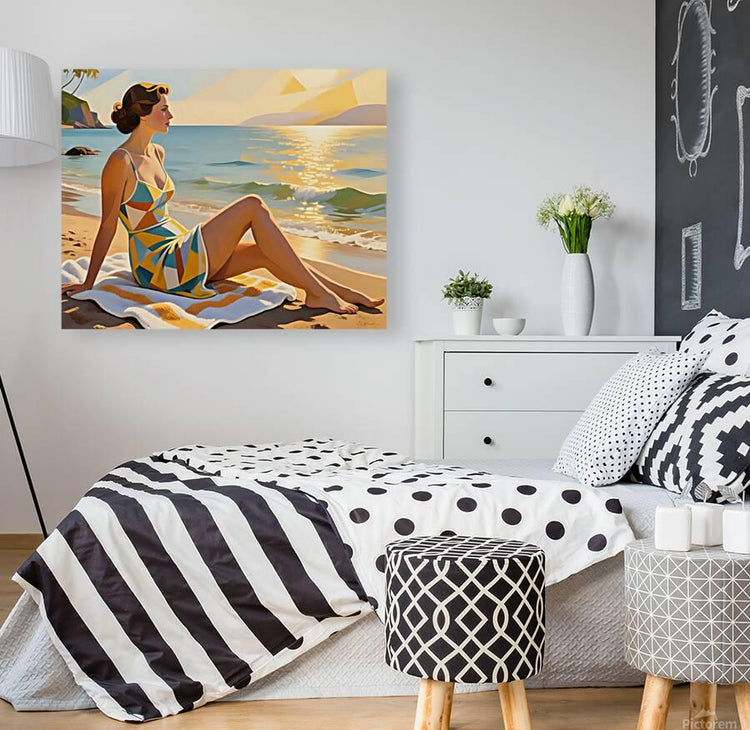 Seated woman in colorful geometric one-piece swimsuit on a beach blanket, facing right