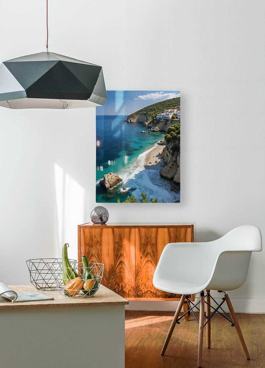Wall-hung canvas print of turquoise sea, sandy beach, and rocky cliffs with homes