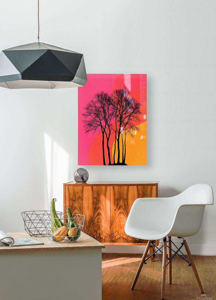 Wall art print with black tree silhouettes on pink and orange sunset background