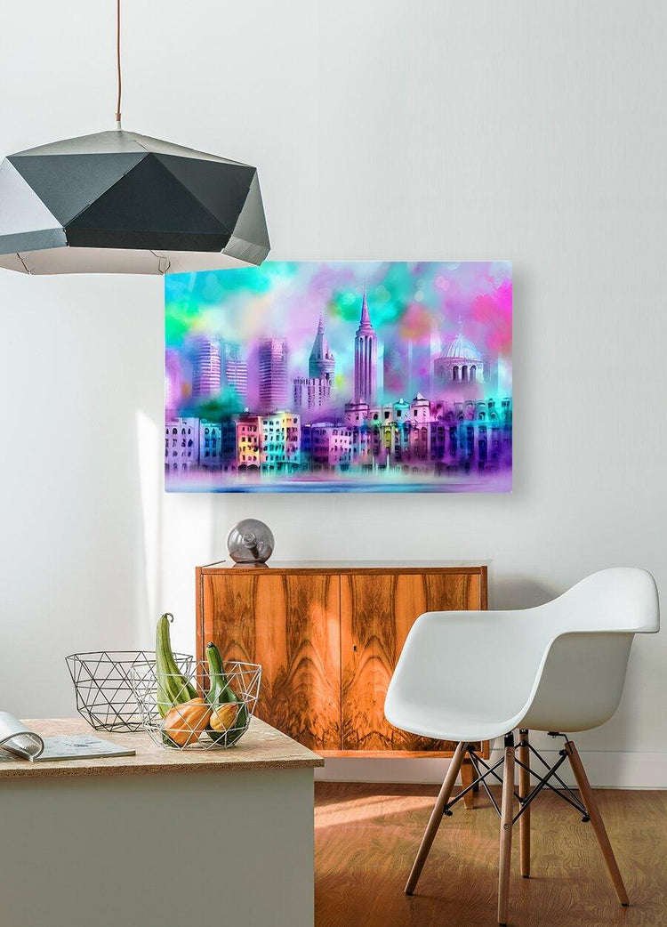Small pastel city skyline wall art print above a wooden cabinet in a modern room