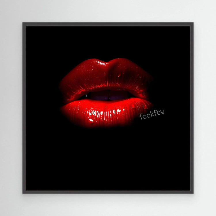 Framed wall art featuring glossy red lips on black background, dark gray frame