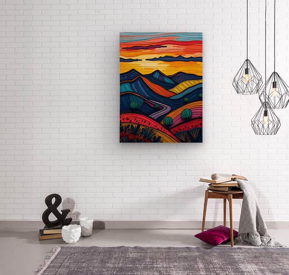 Abstract landscape wall art in frame with colorful mountains, cacti, and curved red band.