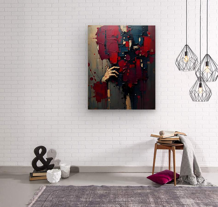 Framed abstract canvas print with a hand in red, blue, and dark drips and blocks