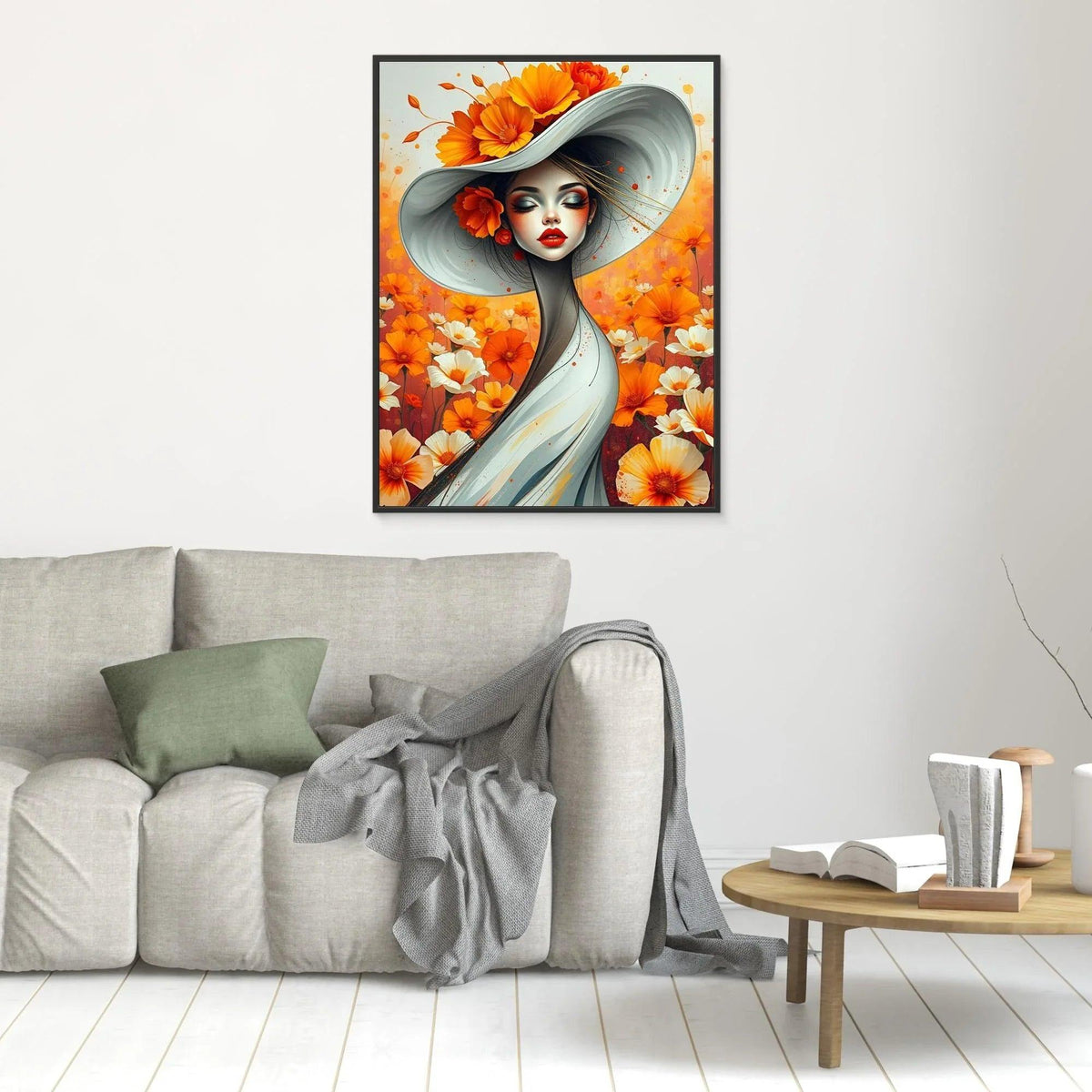 Black-framed floral portrait of a woman in a light blue dress with an orange flower headpiece